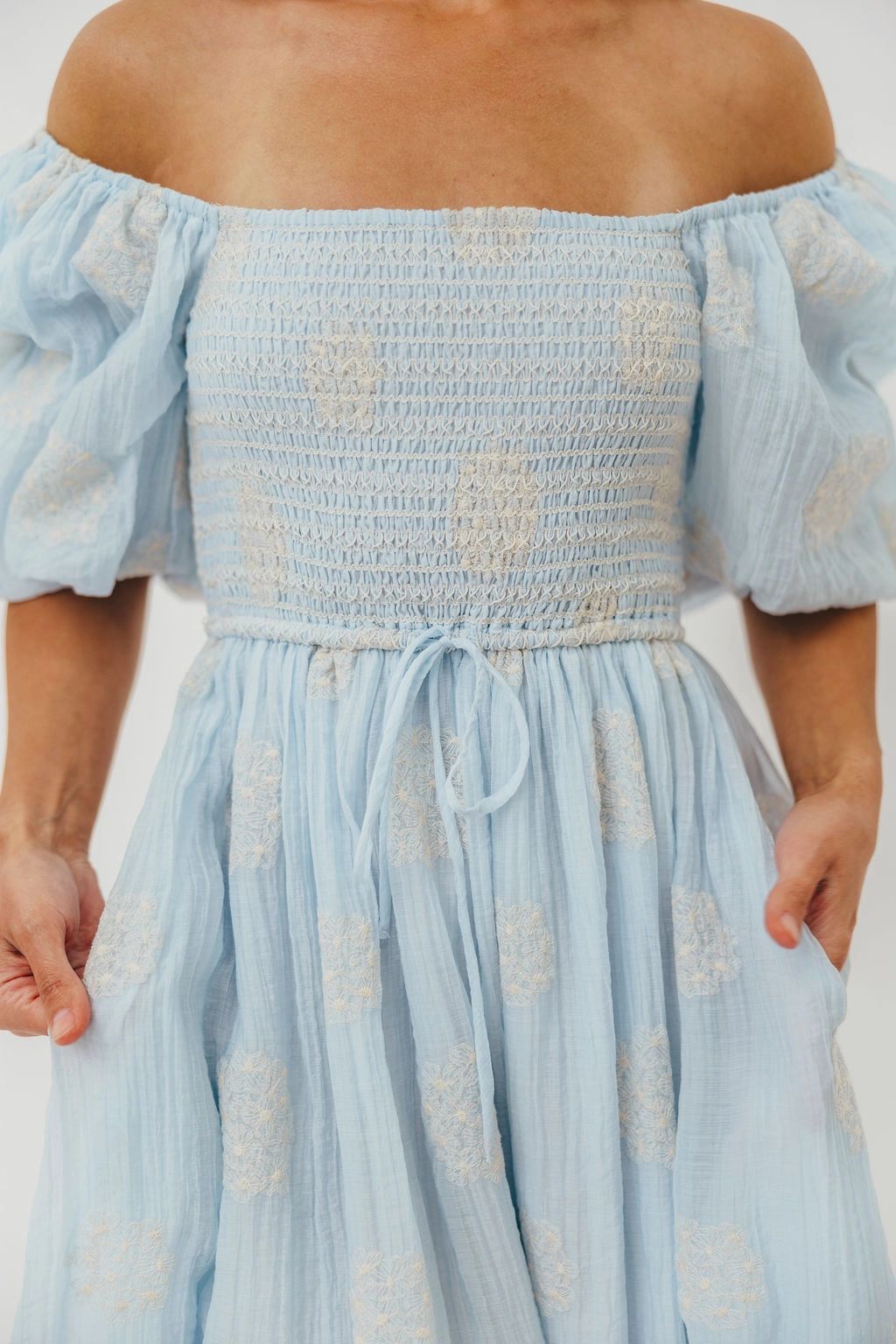 Subtle Glow Aimee Smocked Embroidered Floral Midi Dress in Blue